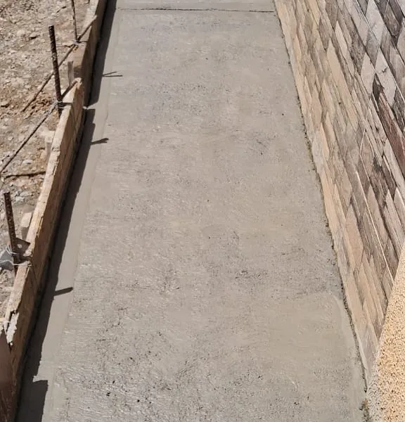 Construcción de aceras peatonales — avance de obra